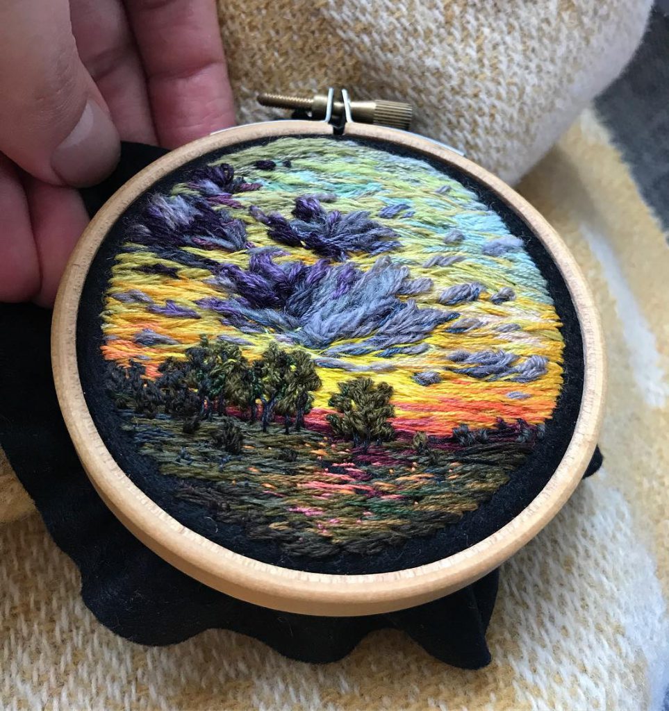 Vera Shimunia Cross Stitching Sunset Over Fields